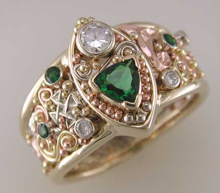 tsavorite and diamond Celtic ring